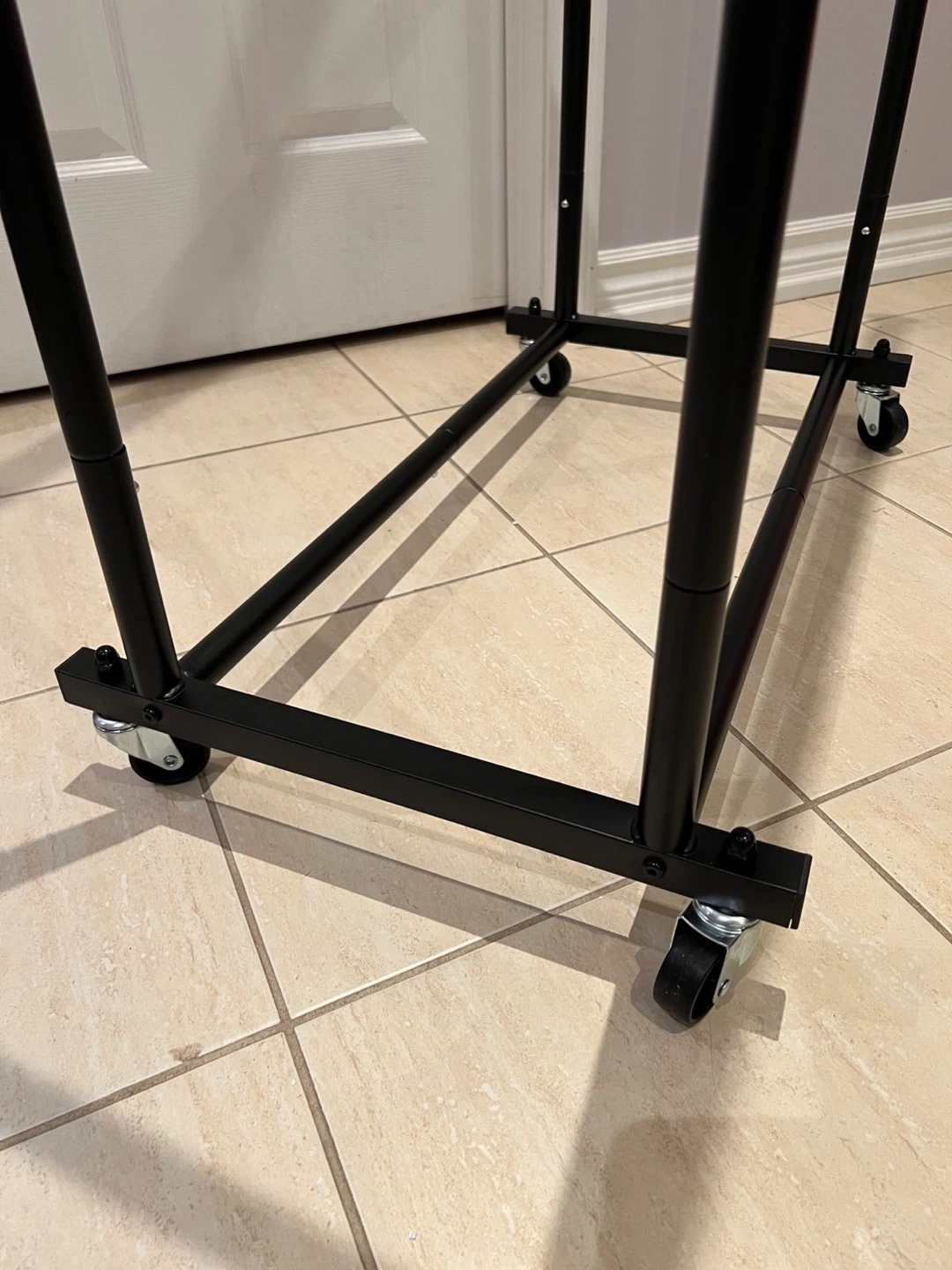 Adjustable Double Rail Rolling Clothes Rack - photo 3