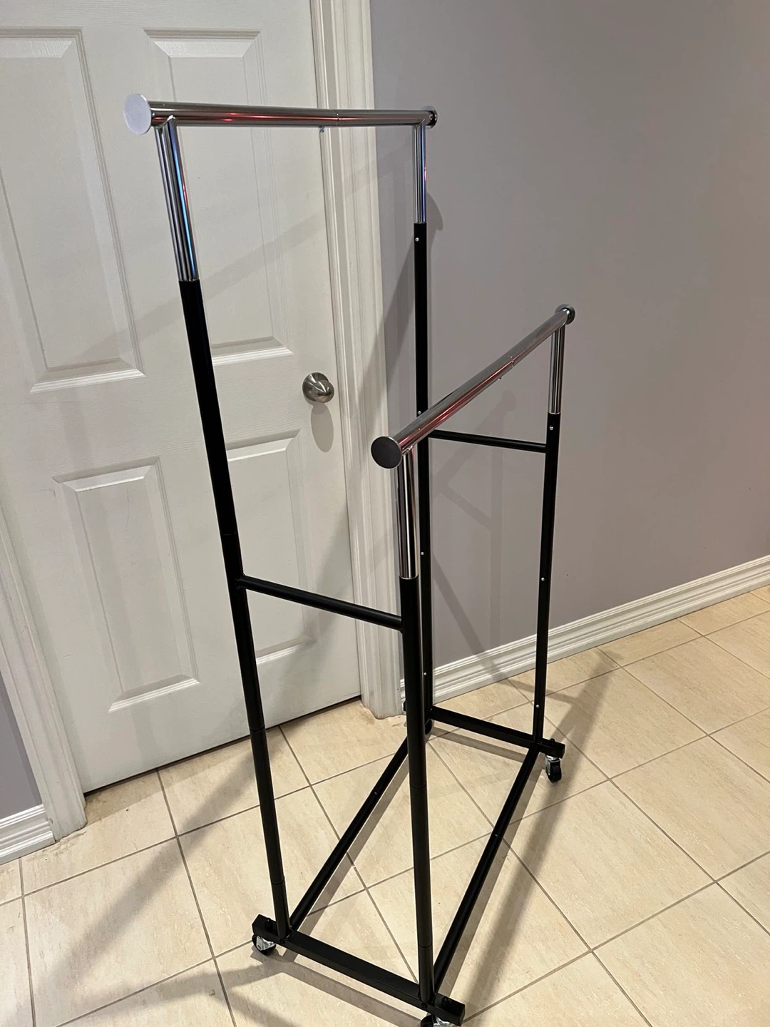 Adjustable Double Rail Rolling Clothes Rack - photo 2