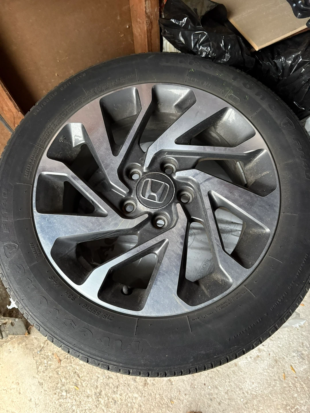 Honda 215/55R16 Tires on rims.