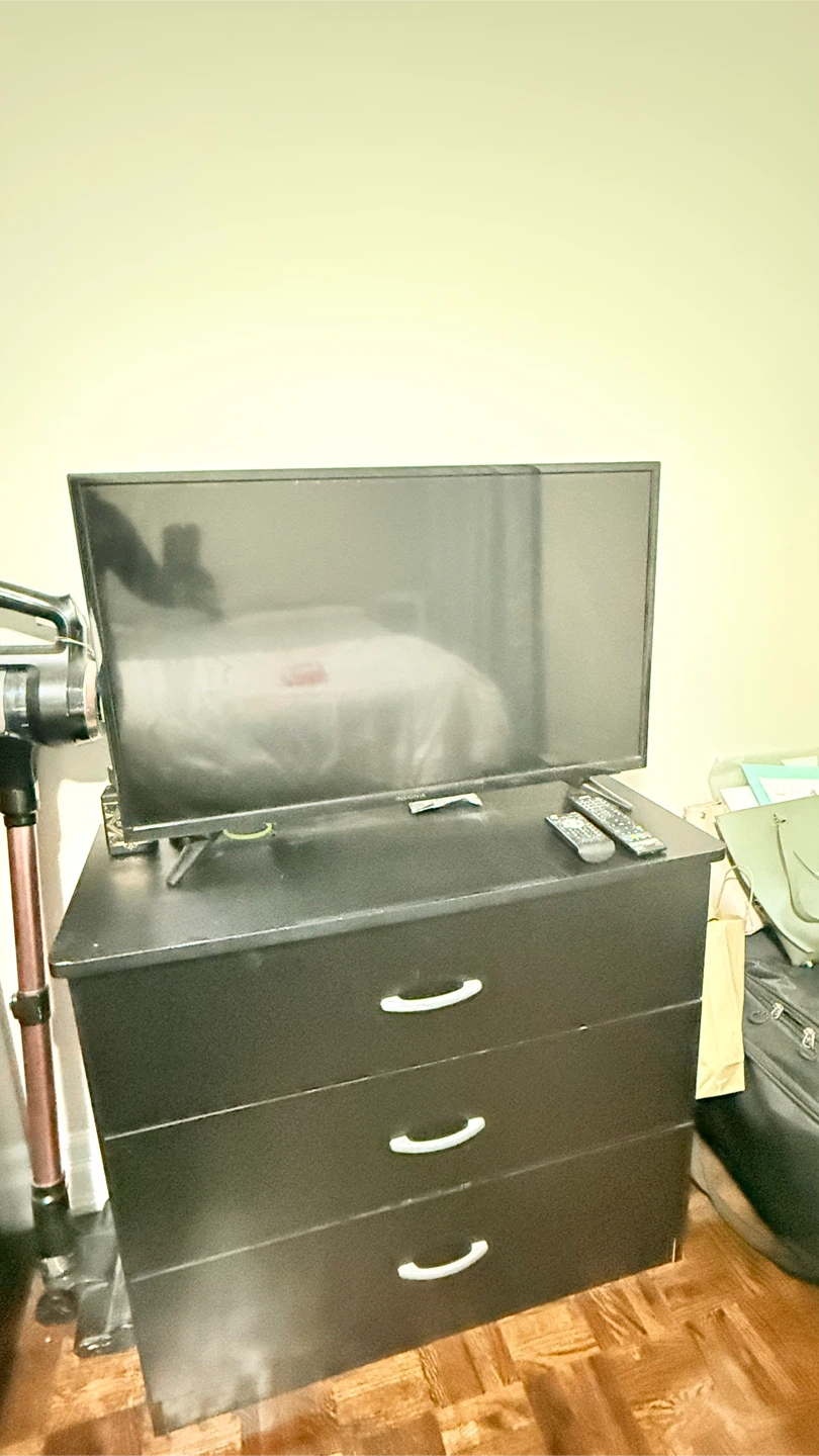 Insignia TV and dresser