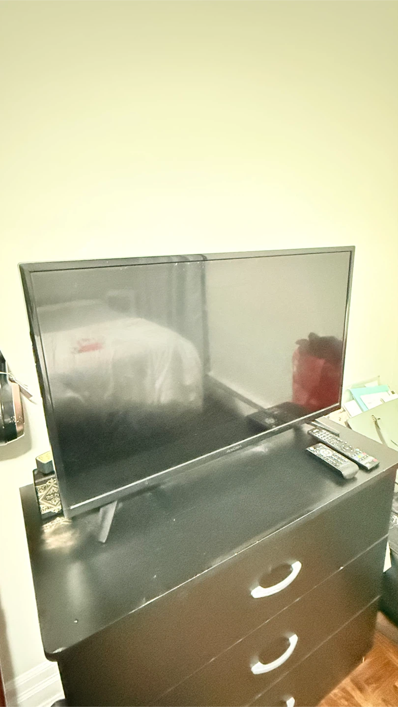 Insignia TV and dresser - photo 2