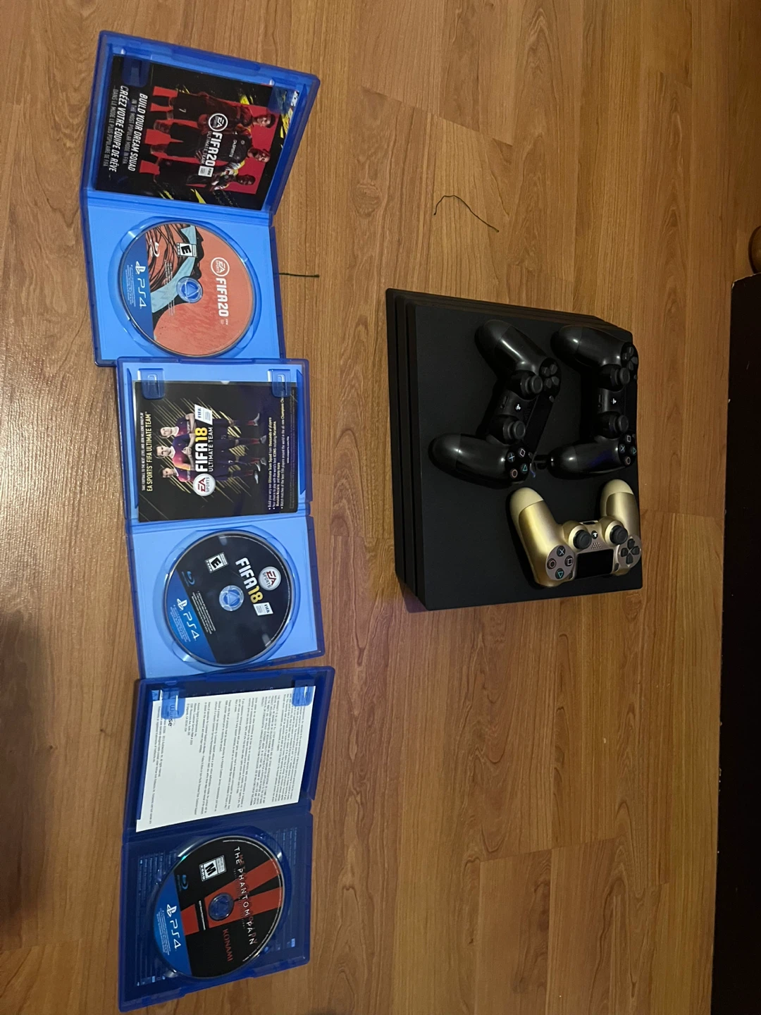 PlayStation 4 Pro Console with Games and Controllers - photo 3