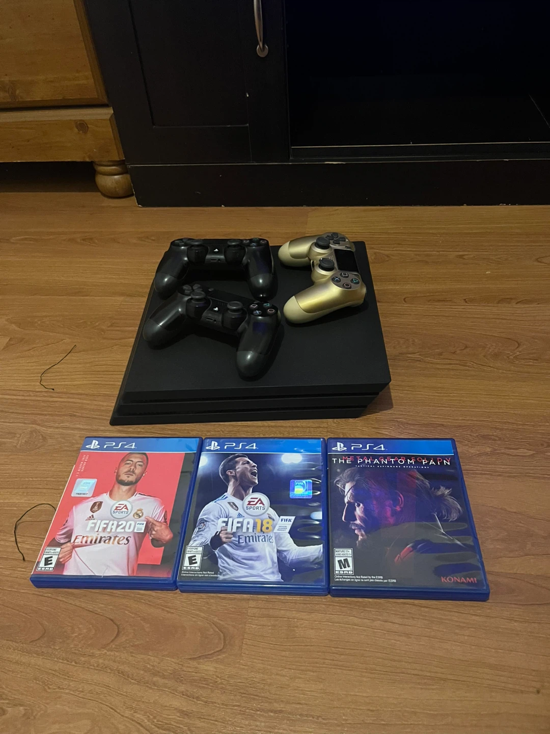 PlayStation 4 Pro Console with Games and Controllers - photo 2