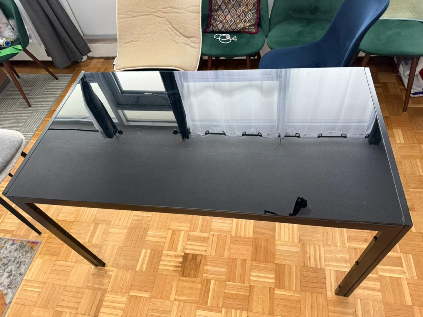 Glass Dining table with 4 Green velvet dining chairs