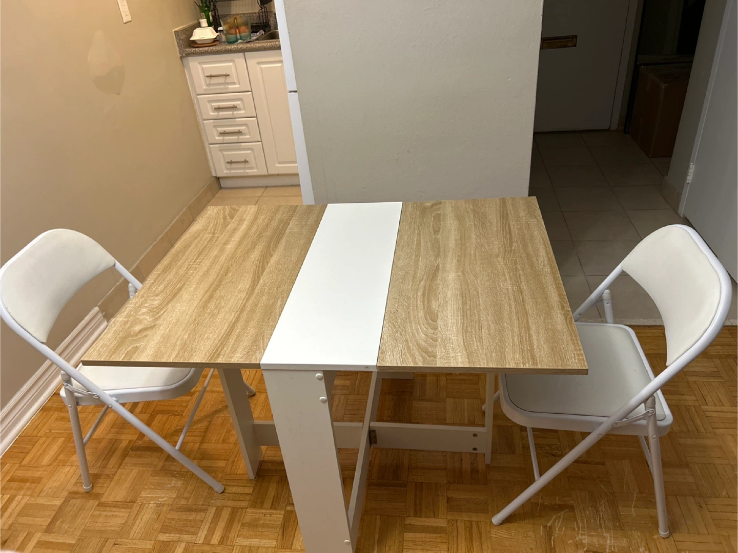 Folding Dining Table with Two White Folding Chairs
