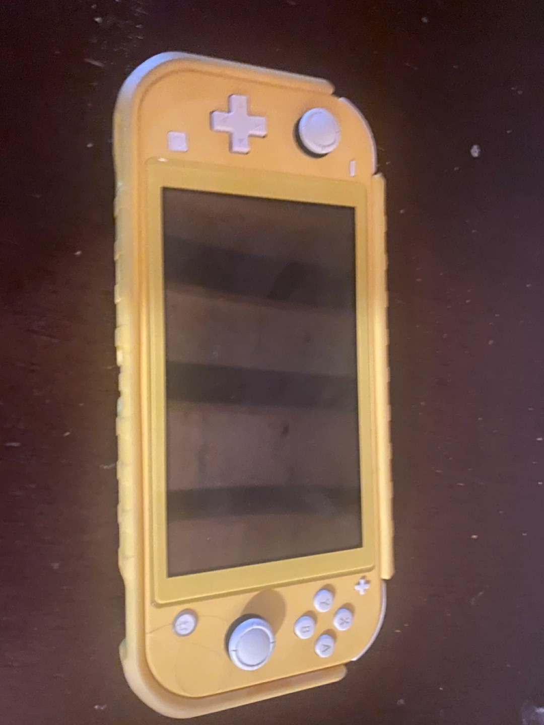 Yellow Nintendo Switch Lite With Protective Case