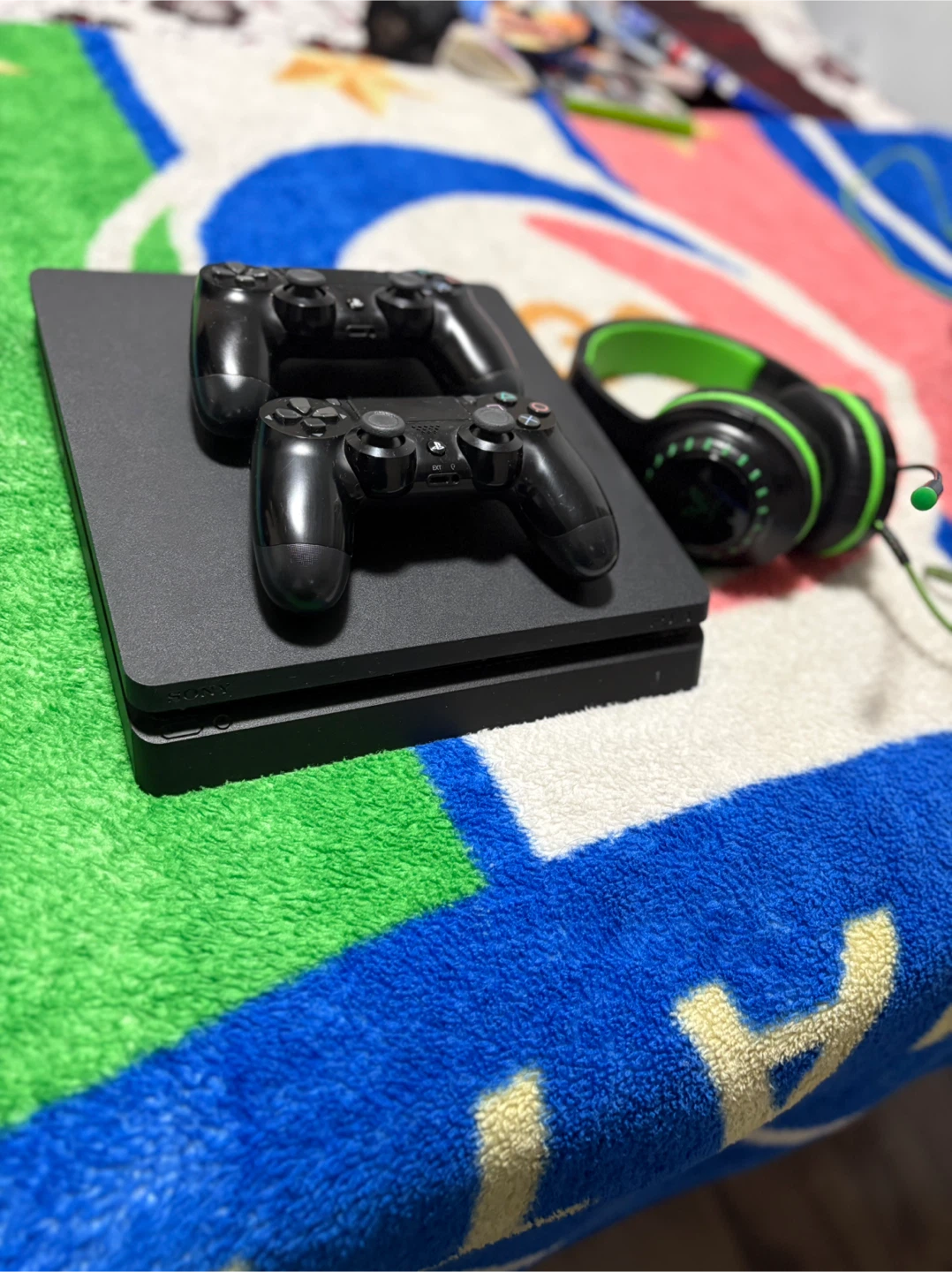 PlayStation 4 Slim with 2 Controllers and a headset. - photo 2