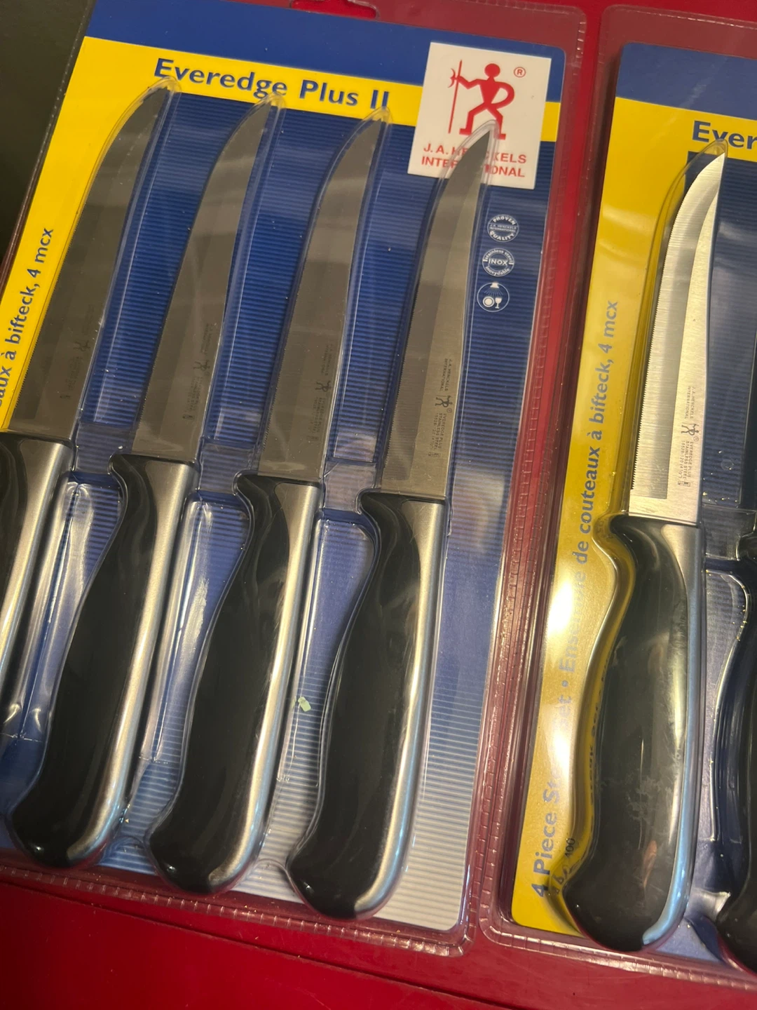 New2sets of 4 $20.  J.A. Henckels Plus II Steak Knife Set