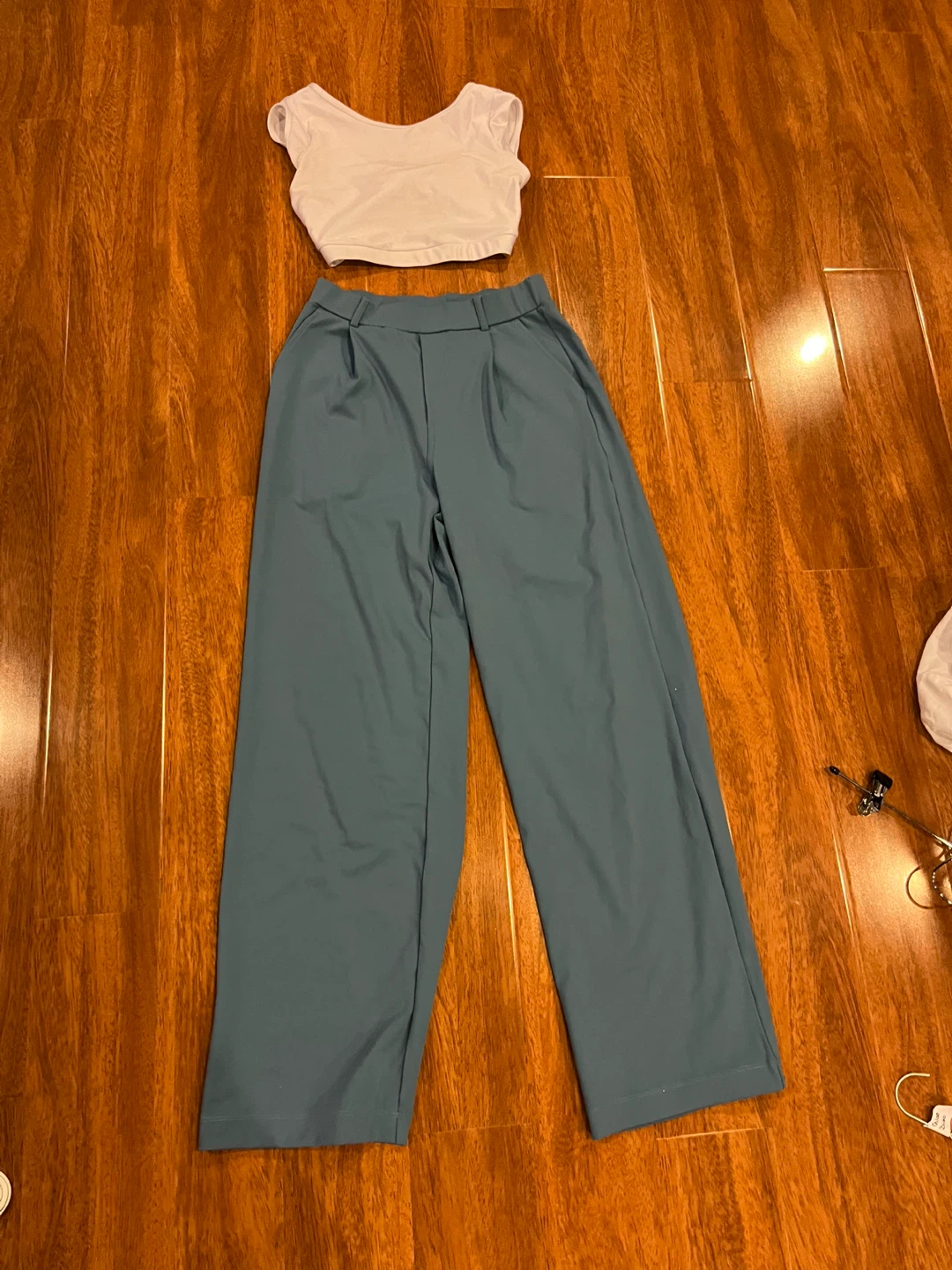 White bow top and blue pant dance costume