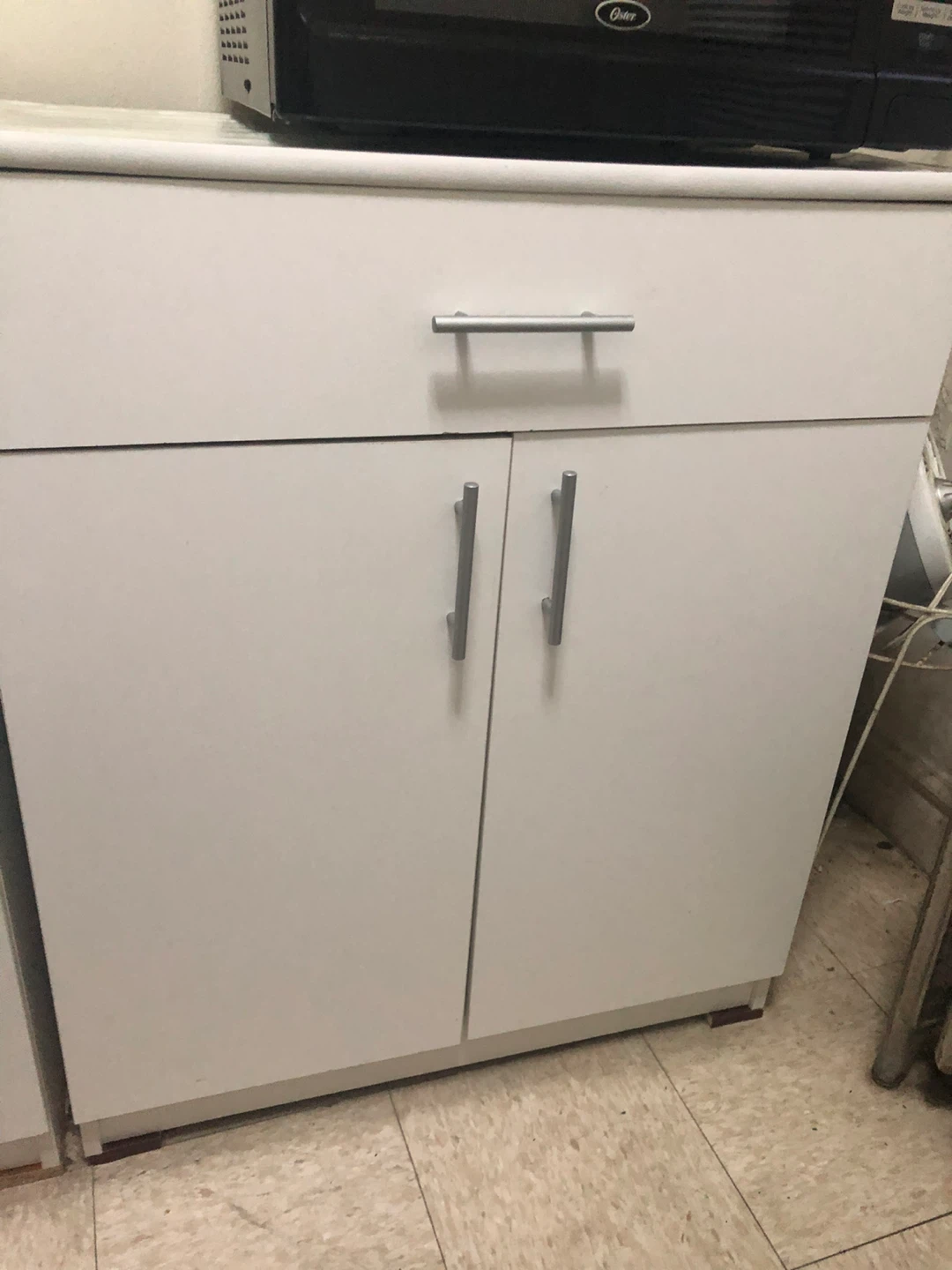 1 White Storage Cabinet
