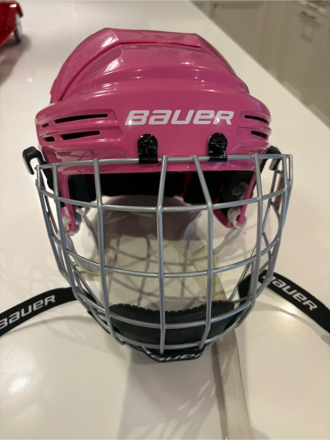 Bauer Pink Hockey Helmet with Cage