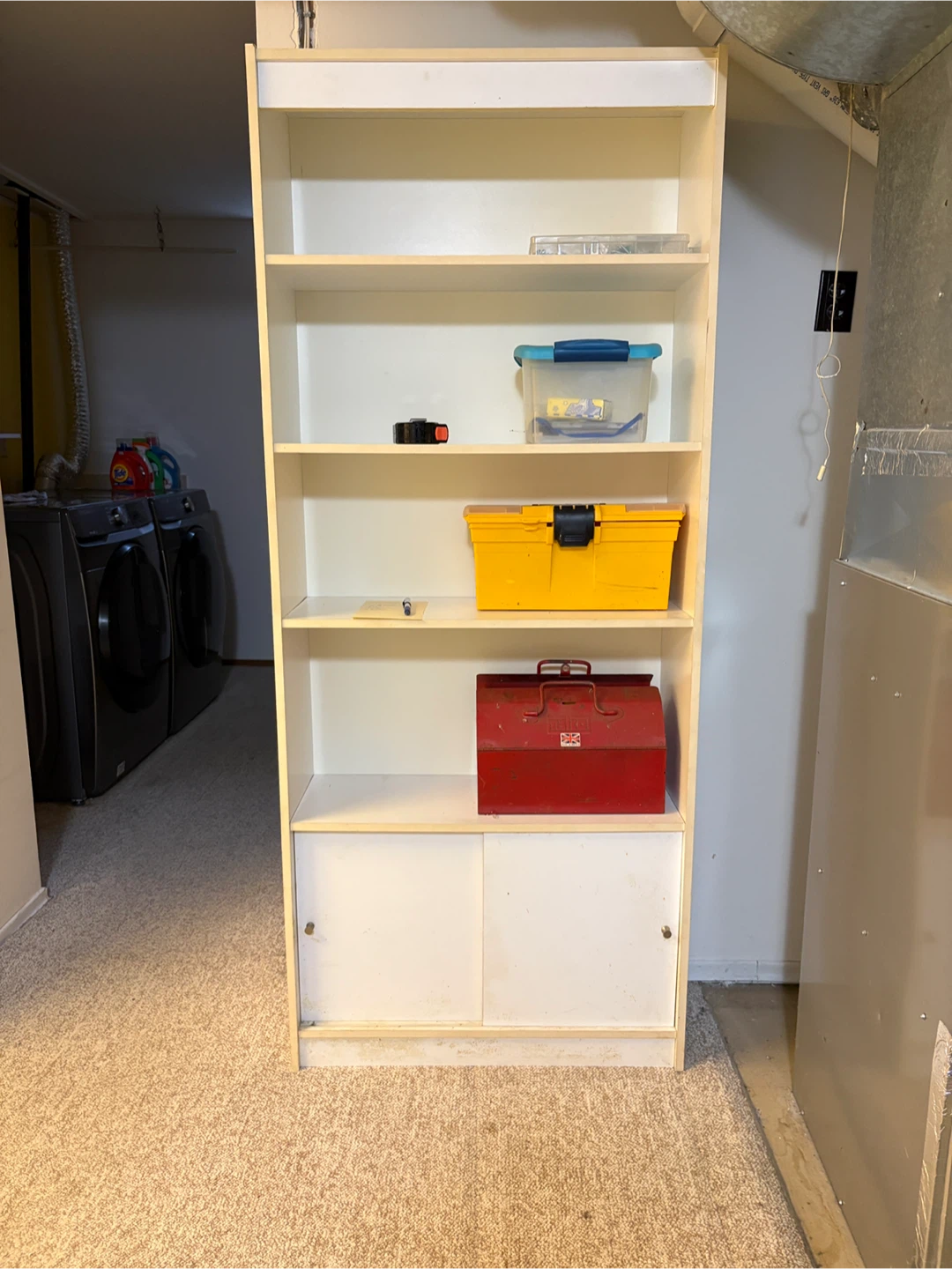 White Bookshelf with Sliding Doors