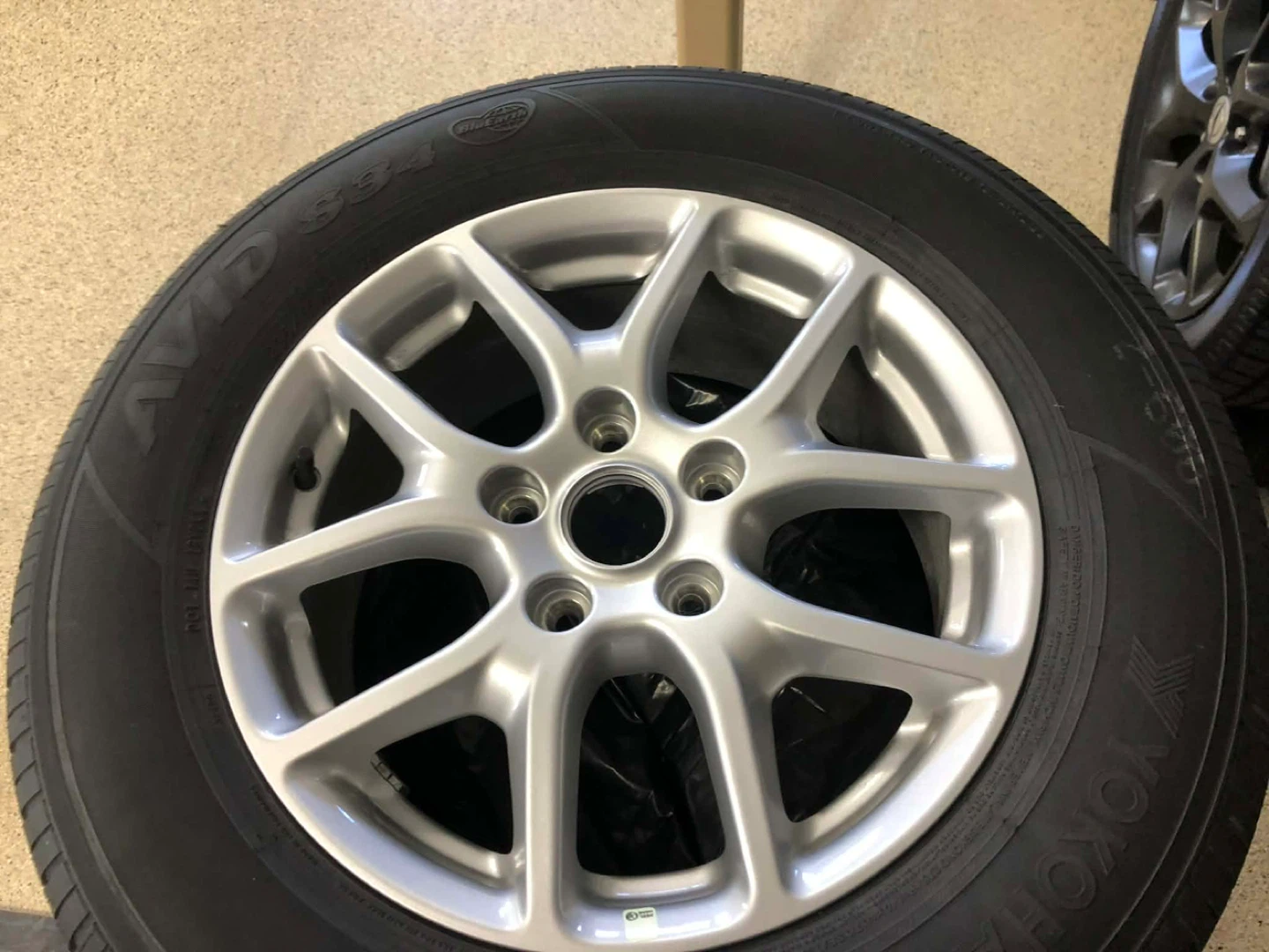 Chrysler Mags & Yokohama Tire. Center caps included.