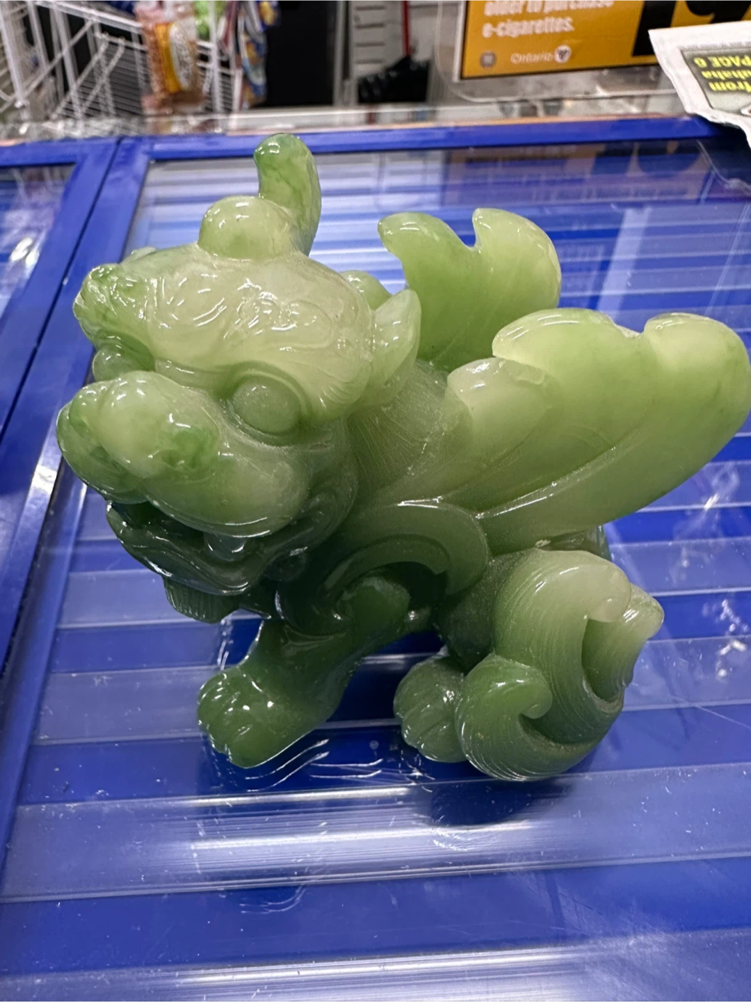 Green Stone Lion Statue