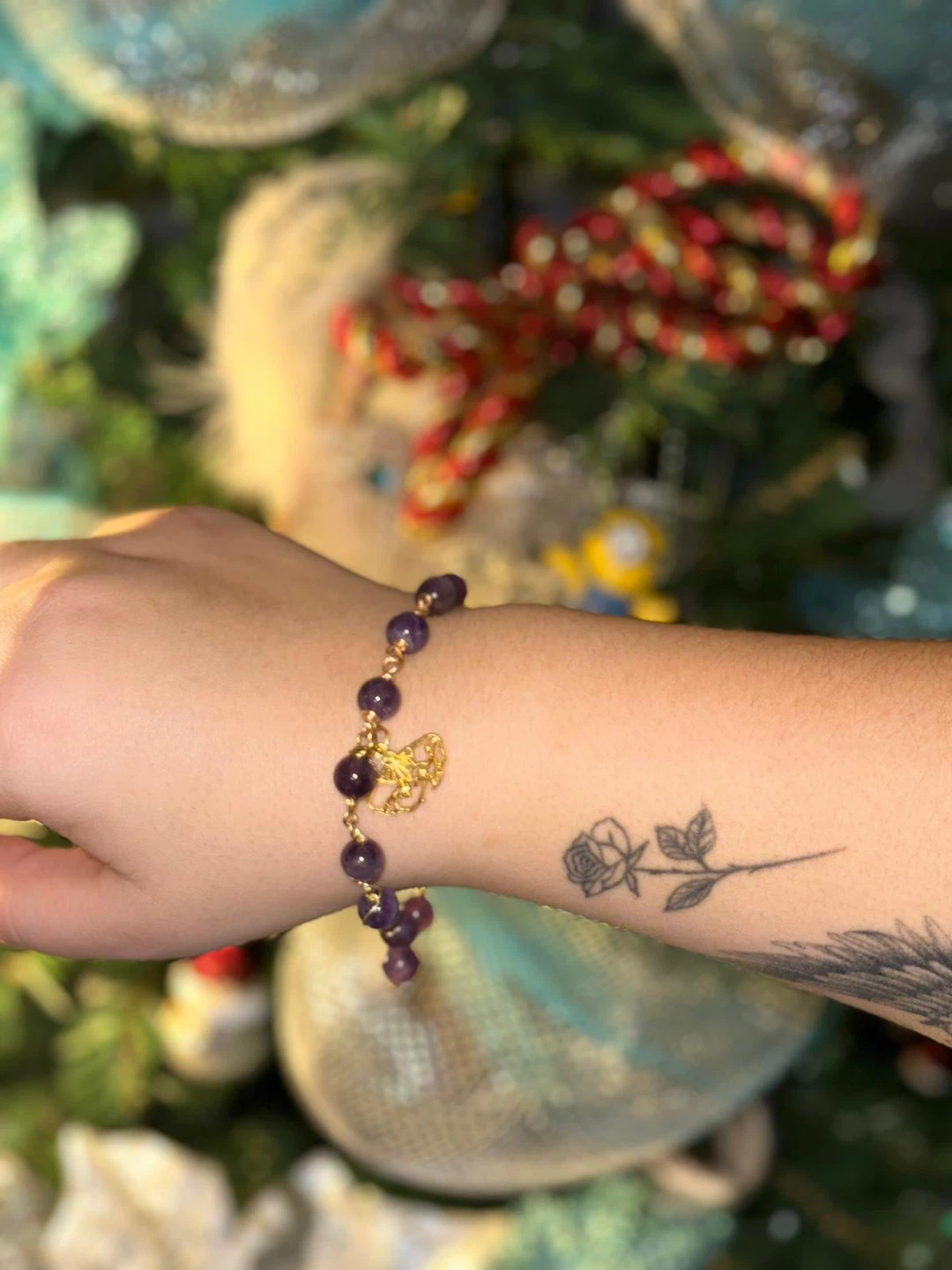 Amethyst beaded bracelet with gold charm