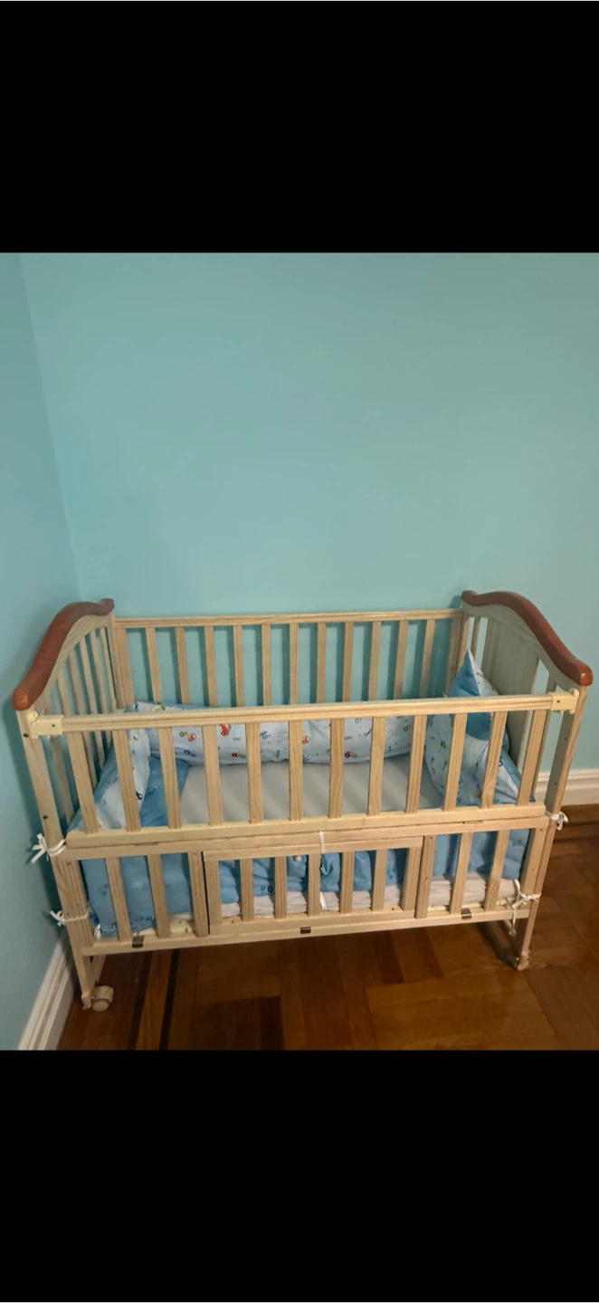 Wooden Baby Crib with opening panel and bedding included