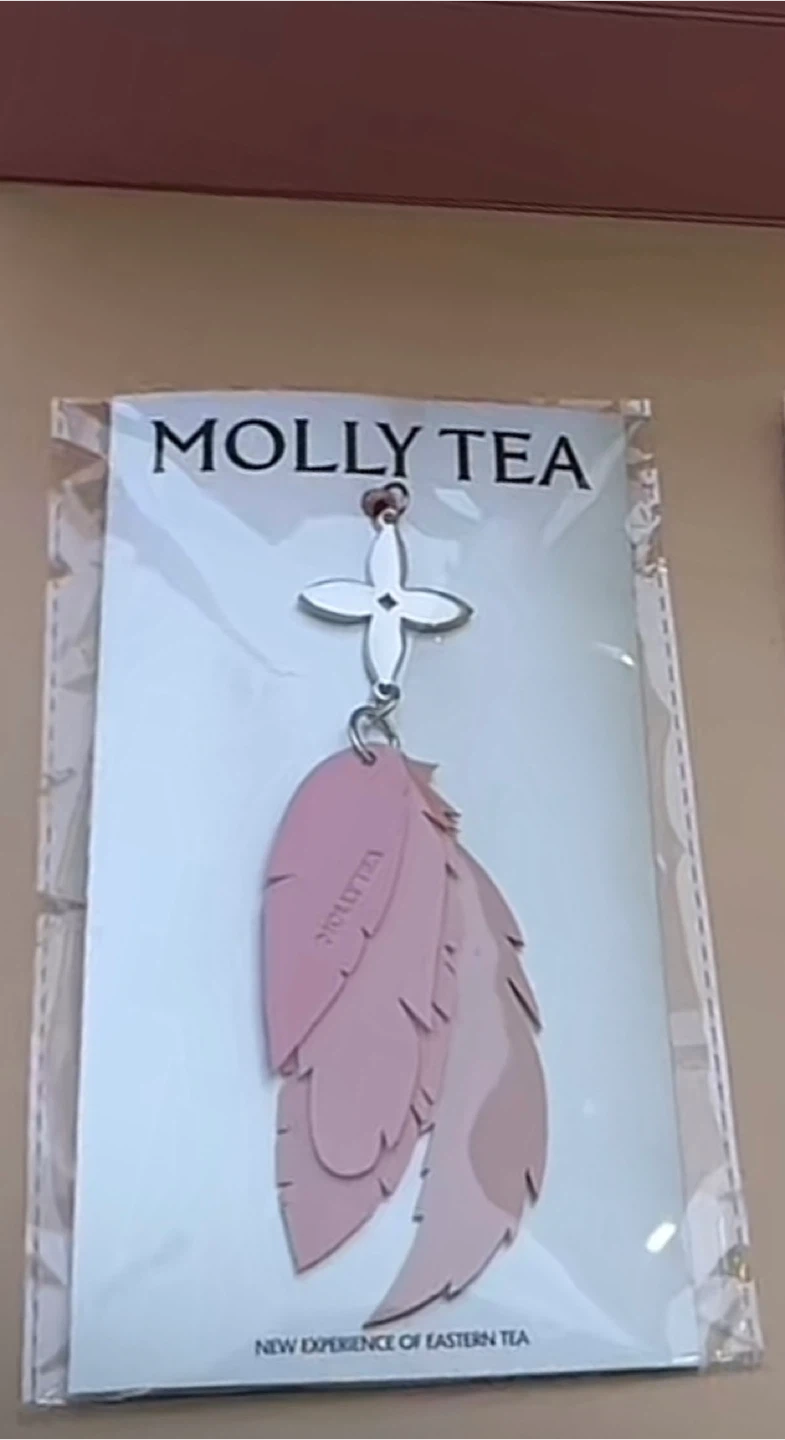 Looking for Molly Tea Feather Keychain - New