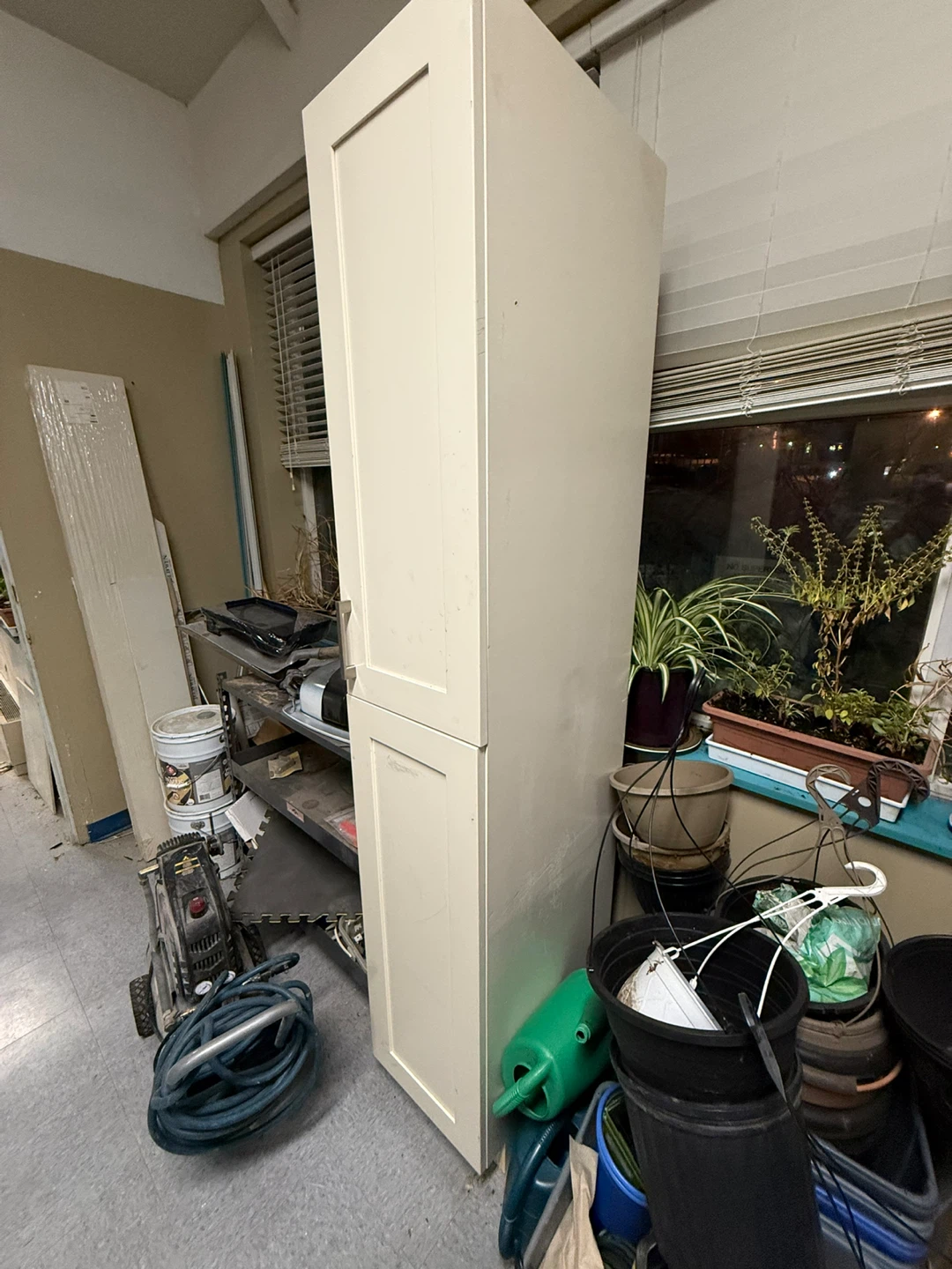 Tall white storage cabinet - photo 2