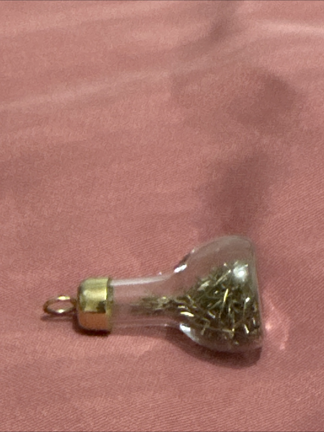 Pendant bottle with 10 K Gold Chips