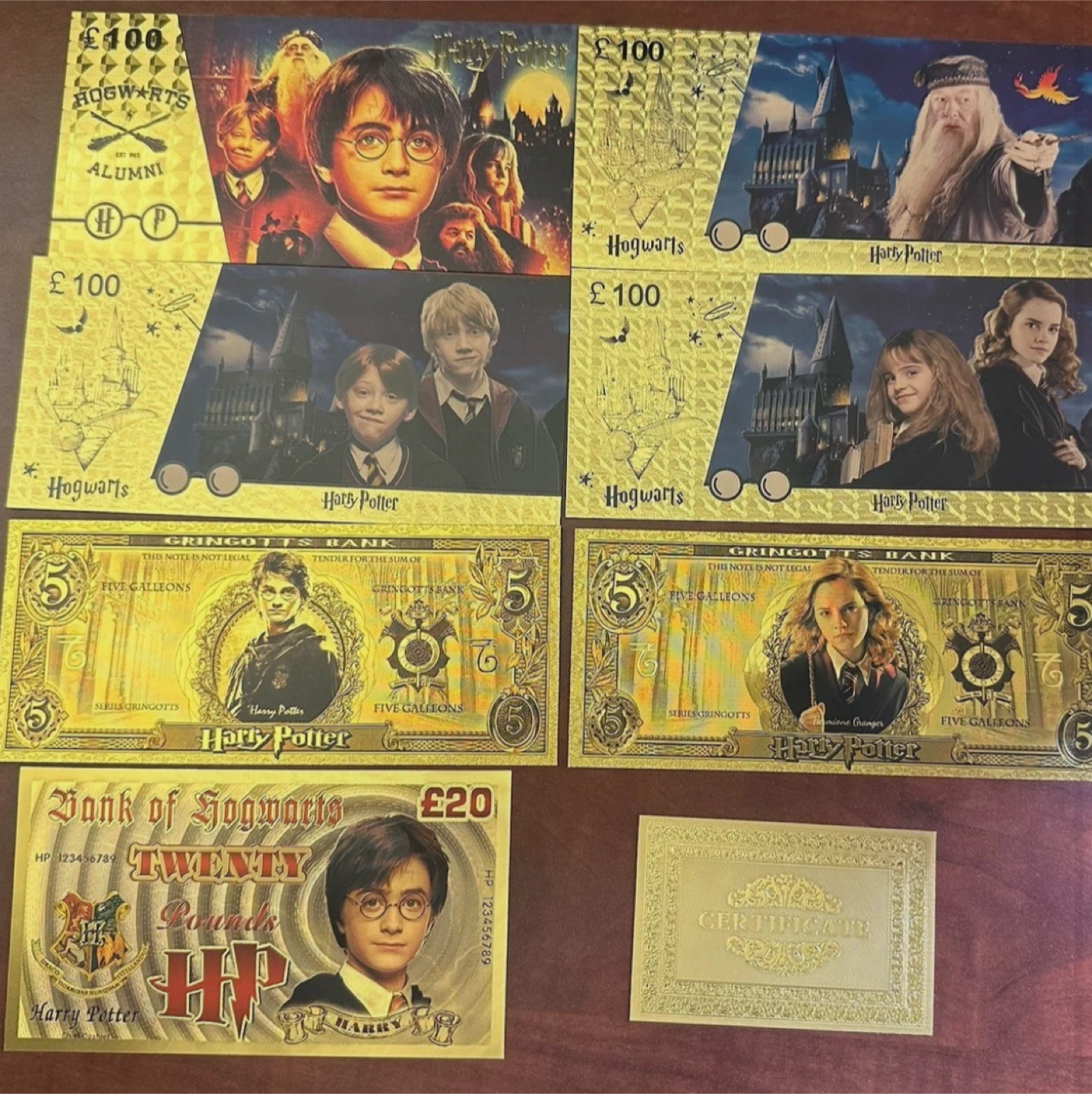 7 Harry Potter Hogwarts Gold Foil Bank Notes Set