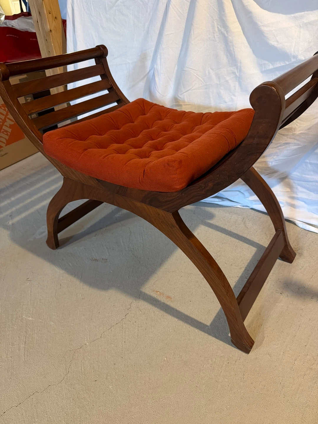 Wood Bench with Orange Cushion