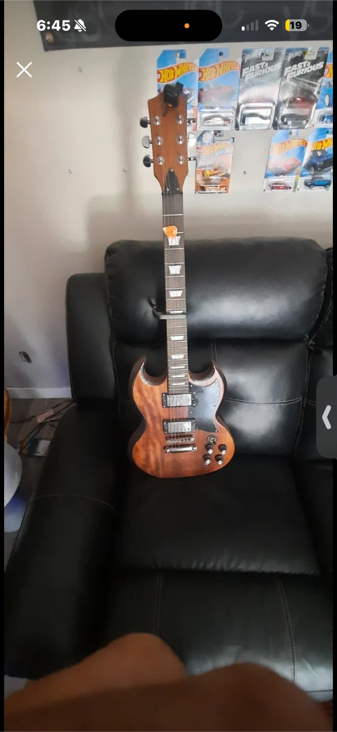 Electric Guitar, Valued around 200-300.