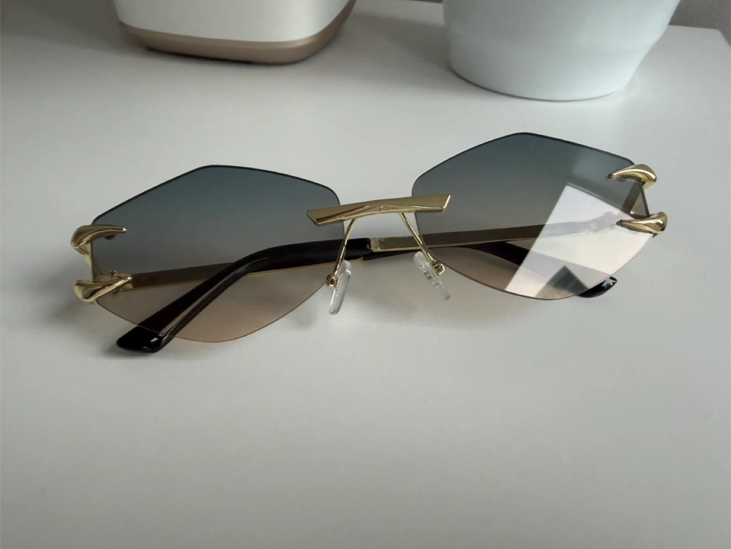 Rimless Sunglasses with Gold Hardware