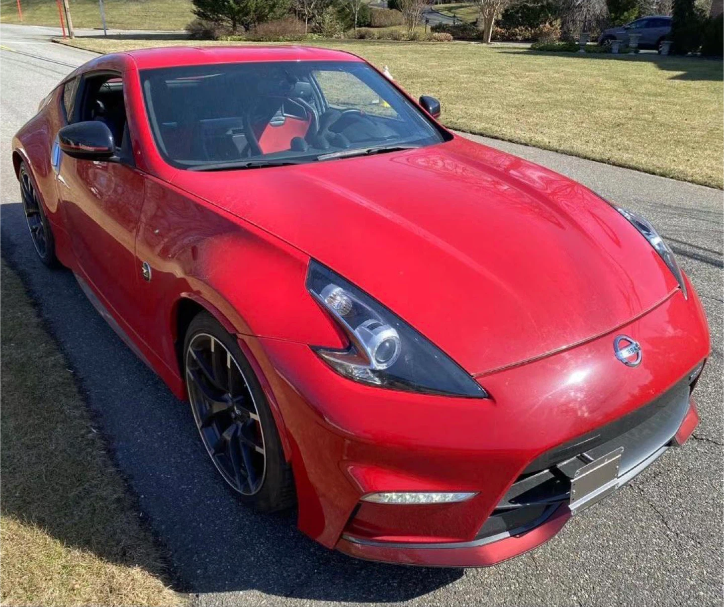Red Nissan 370Z Nismo