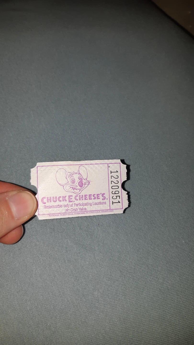 Pile o Chuck-E-Cheese Tickets and 2 token buckets