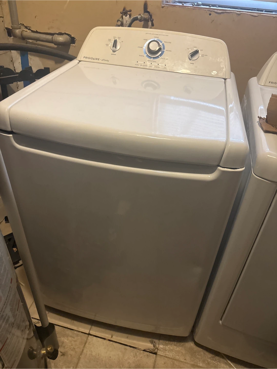 Used washer machine . (Bring help to move it)