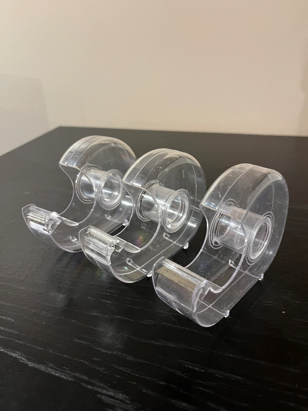 Three tape dispensers