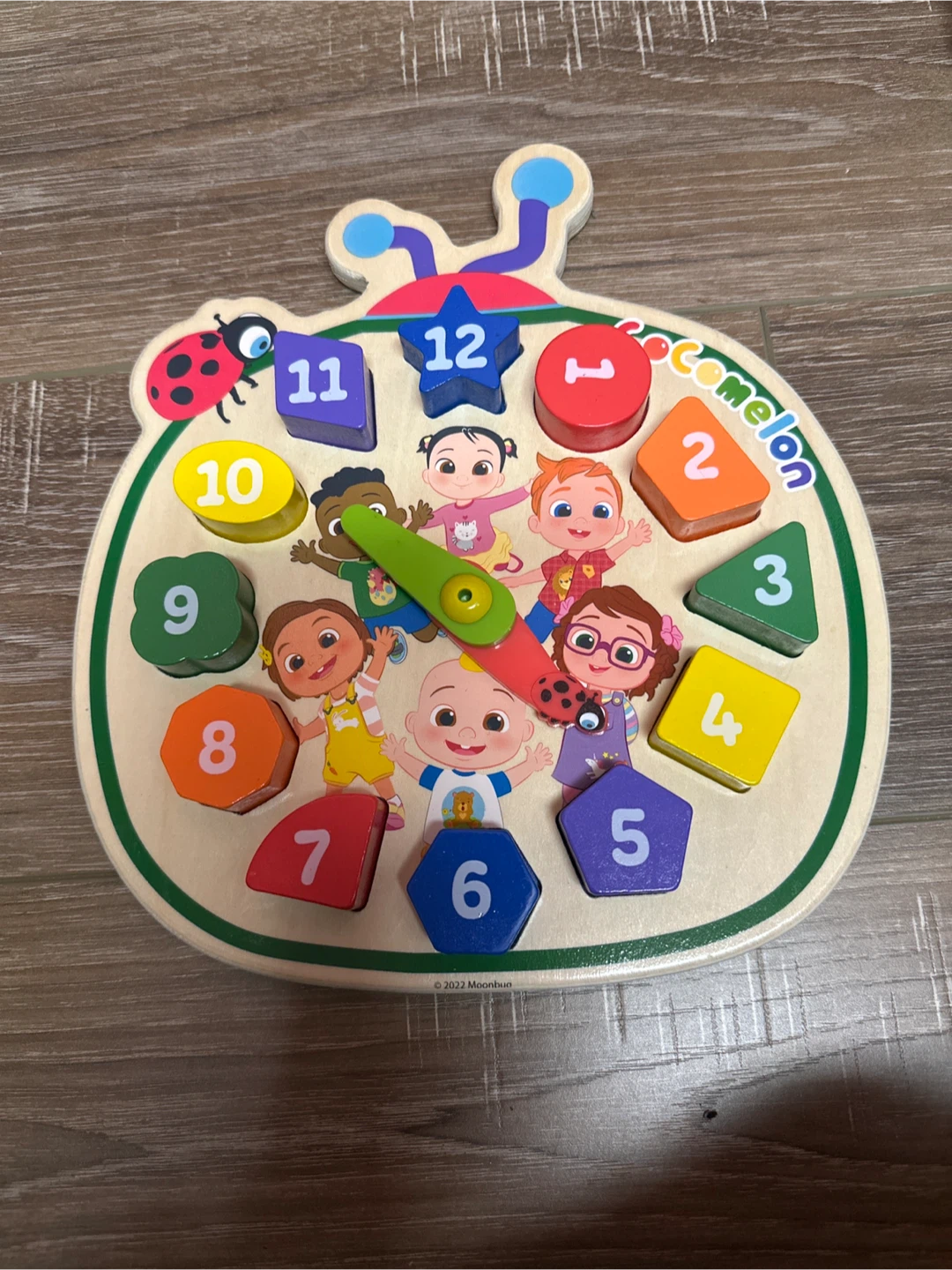 Cocomelon Wooden Shape Sorting Clock Puzzle