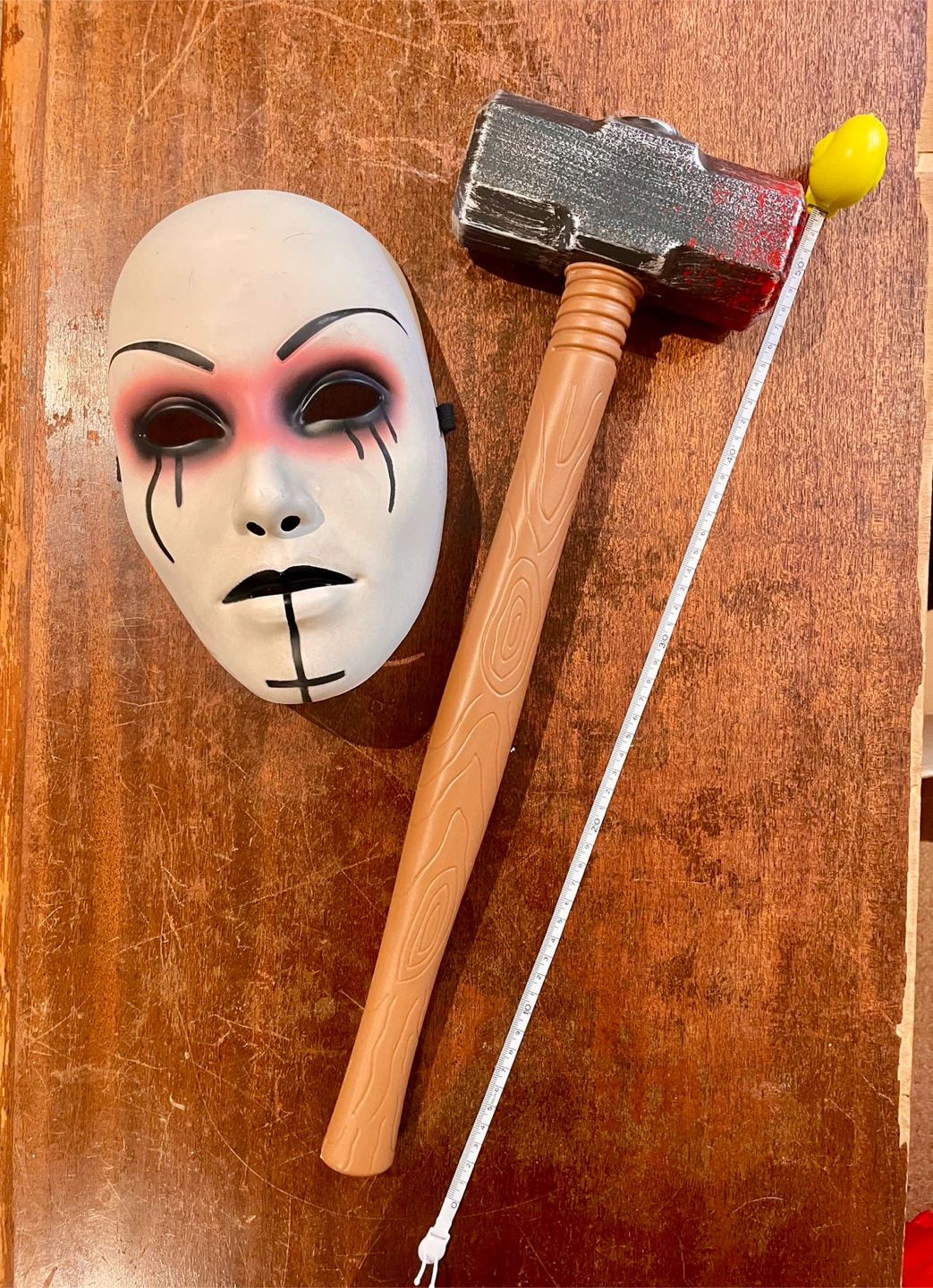 Mask and Toy Hammer