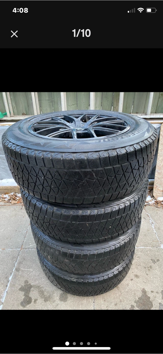 Set of Black Rims and Winter Tires