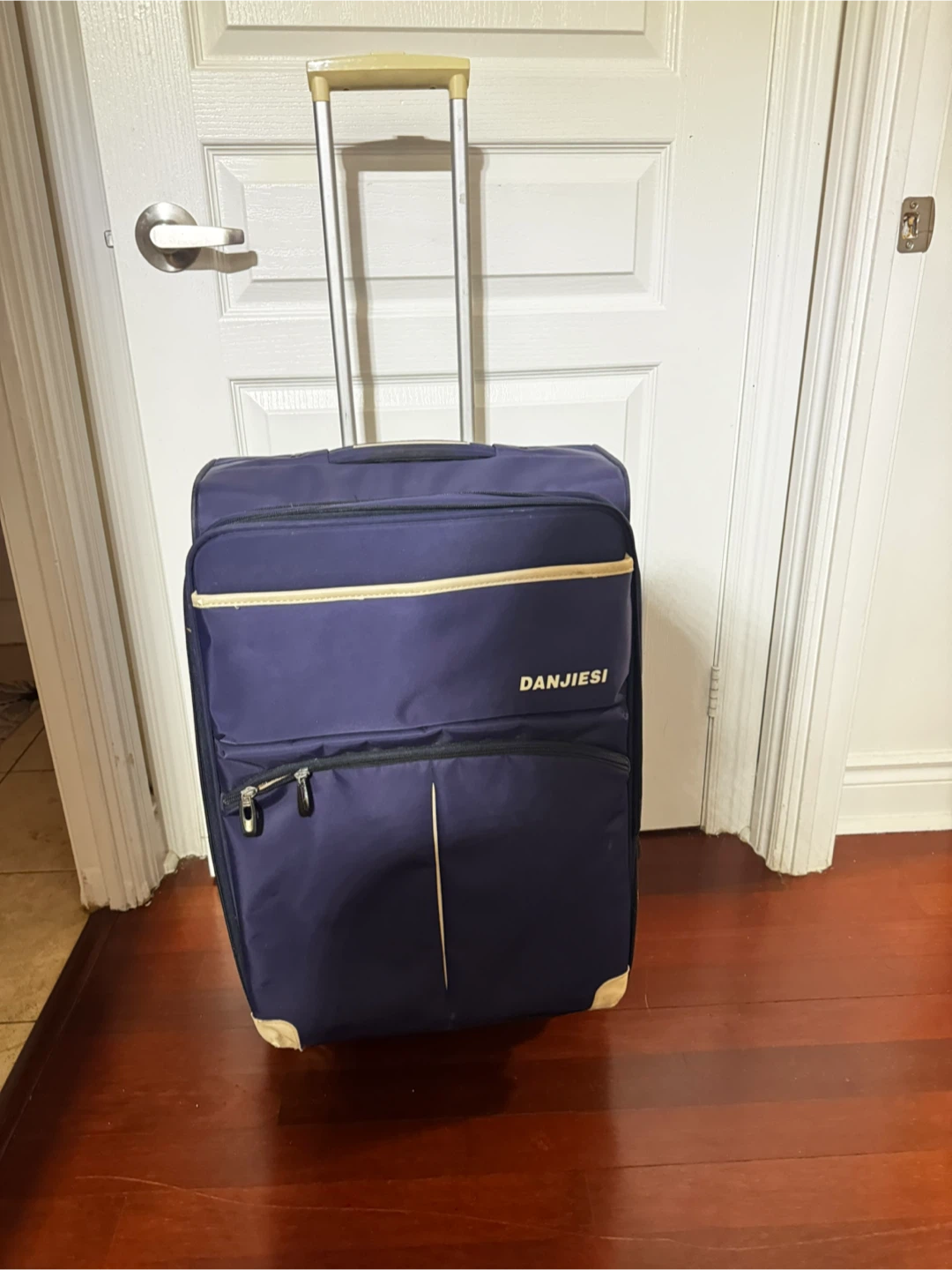 DANJIESI Blue Rolling Suitcase (medium)