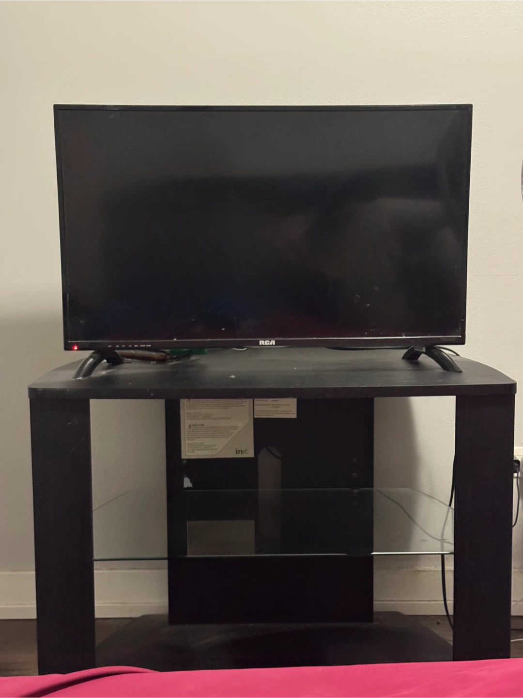 RCA TV on Black TV Stand