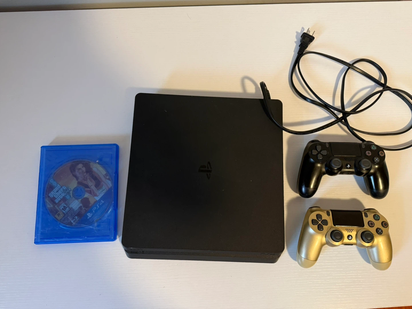 PlayStation 4 Slim Console with 2 Controllers
