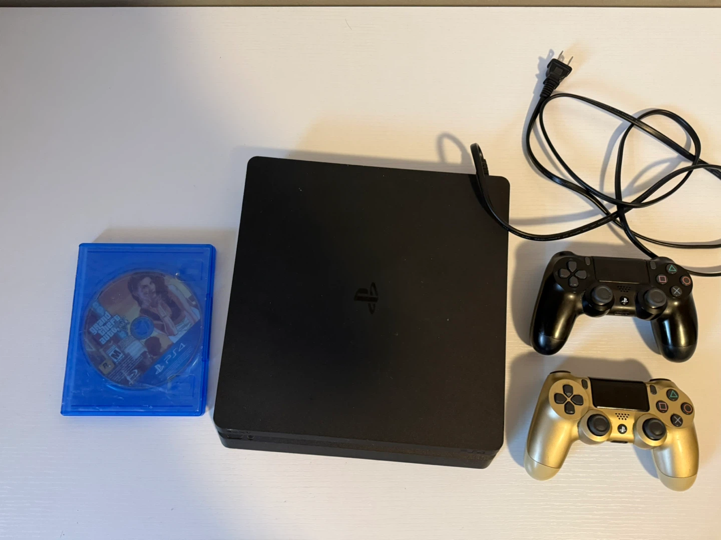 PlayStation 4 Slim Console with 2 Controllers - photo 2