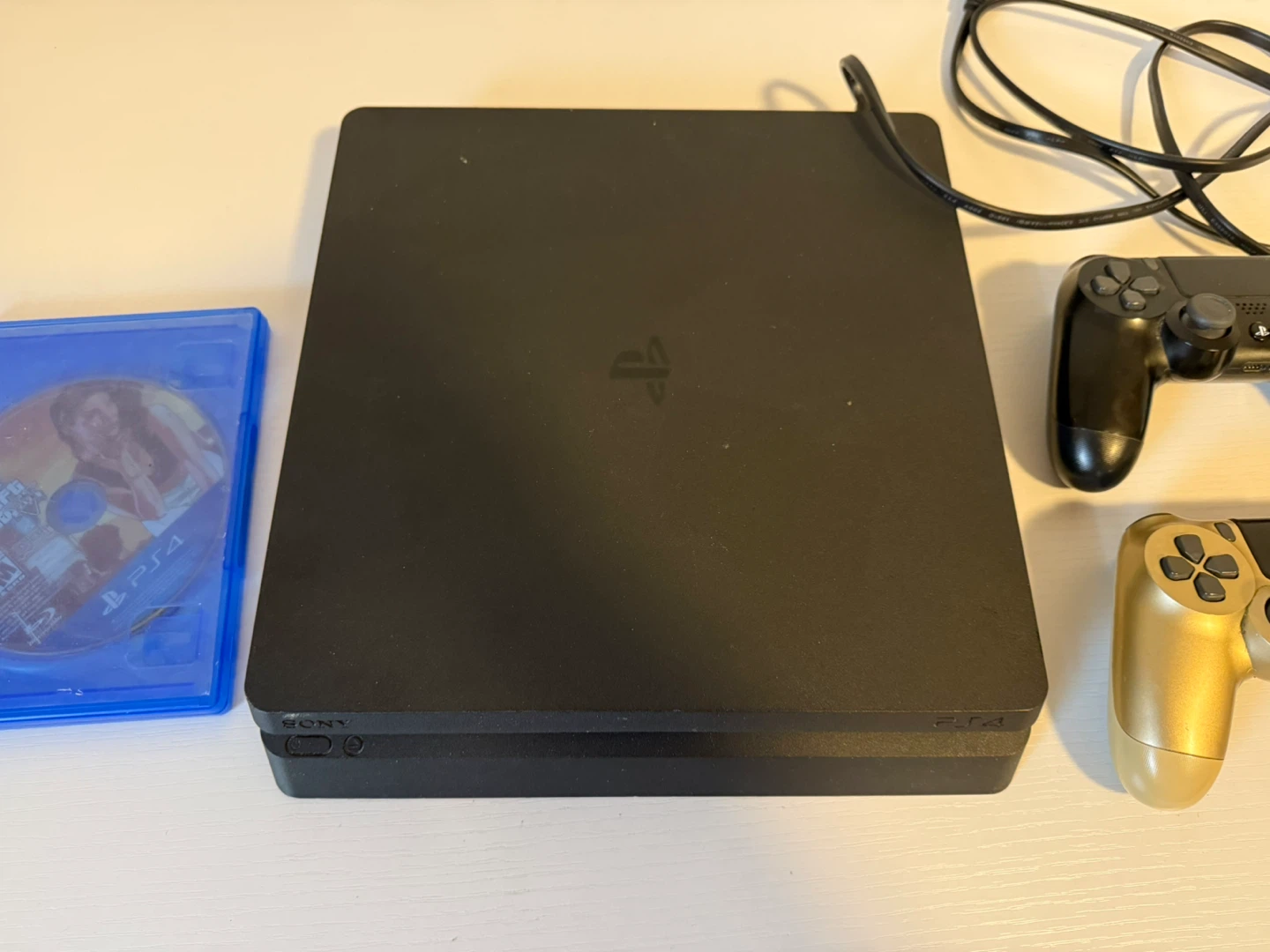 PlayStation 4 Slim Console with 2 Controllers - photo 3