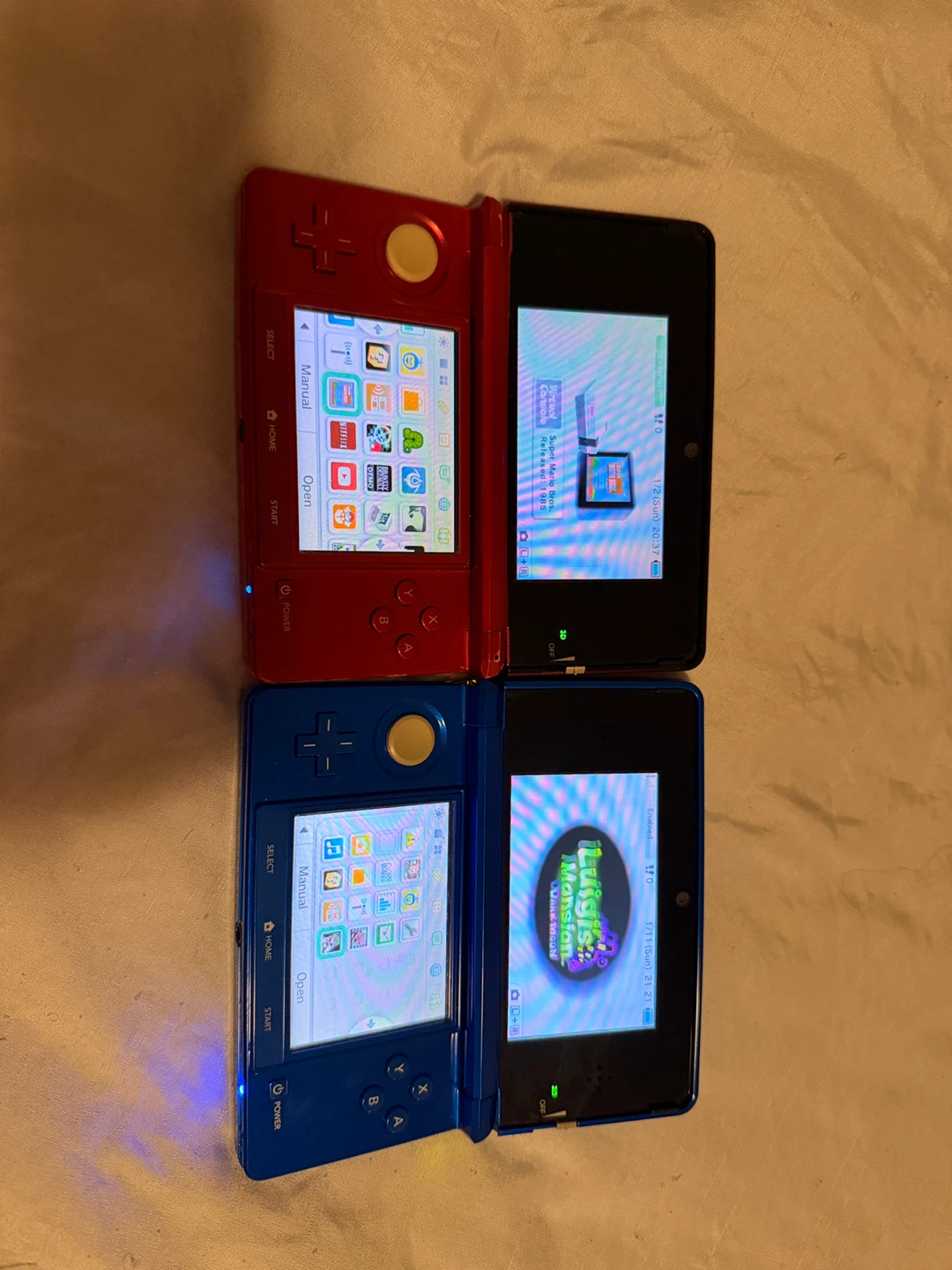 Nintendo 3DS Red & Blue Consoles