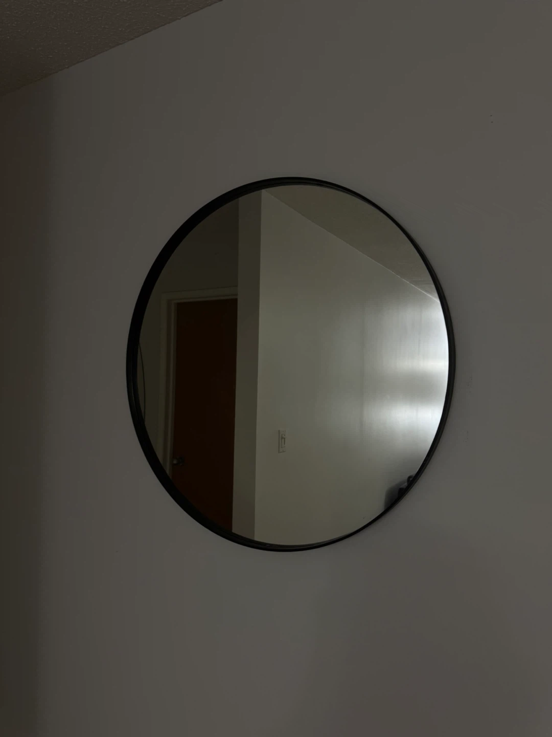 Round Black Framed Mirror