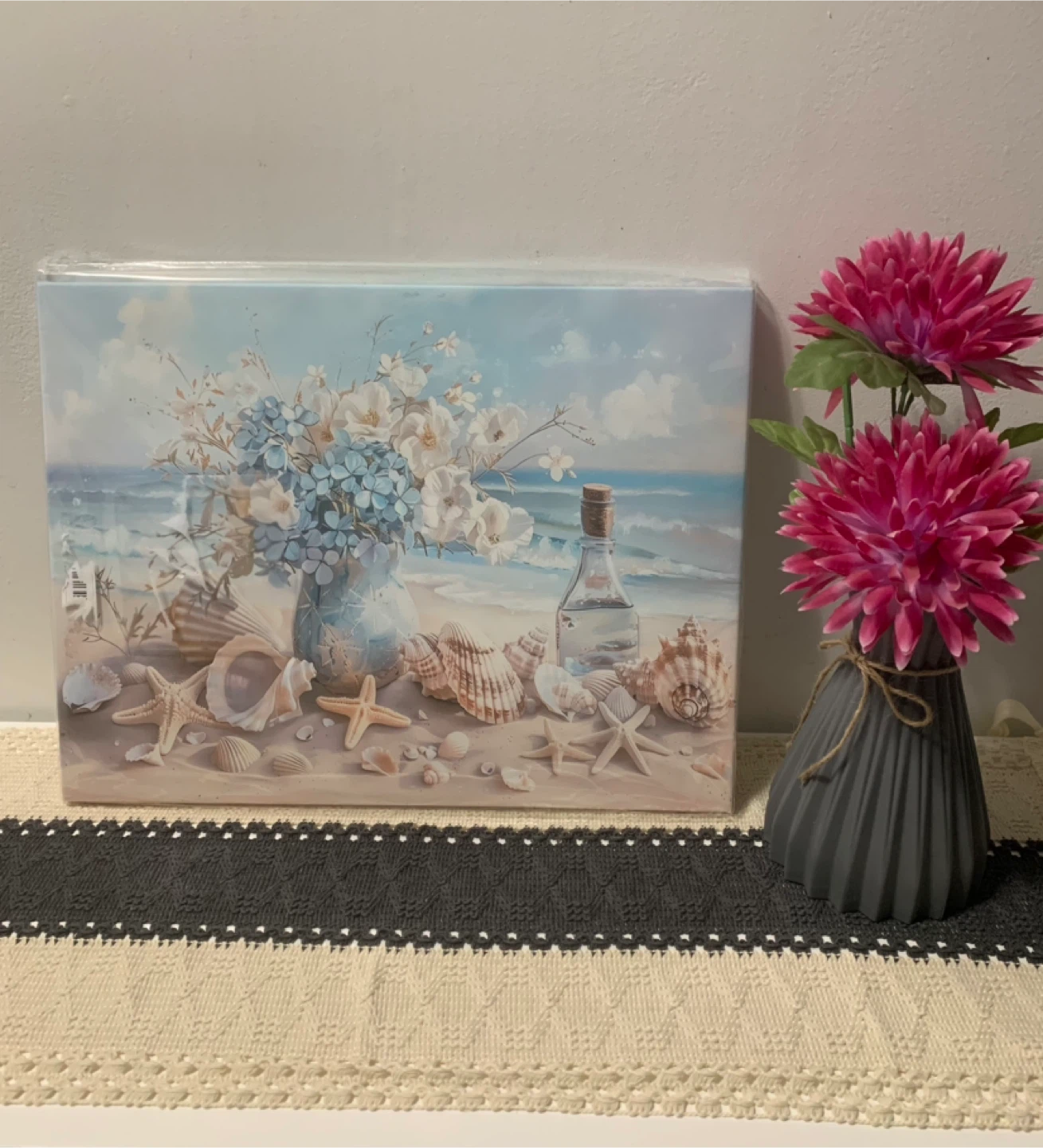 Canvas wall art and flower pot