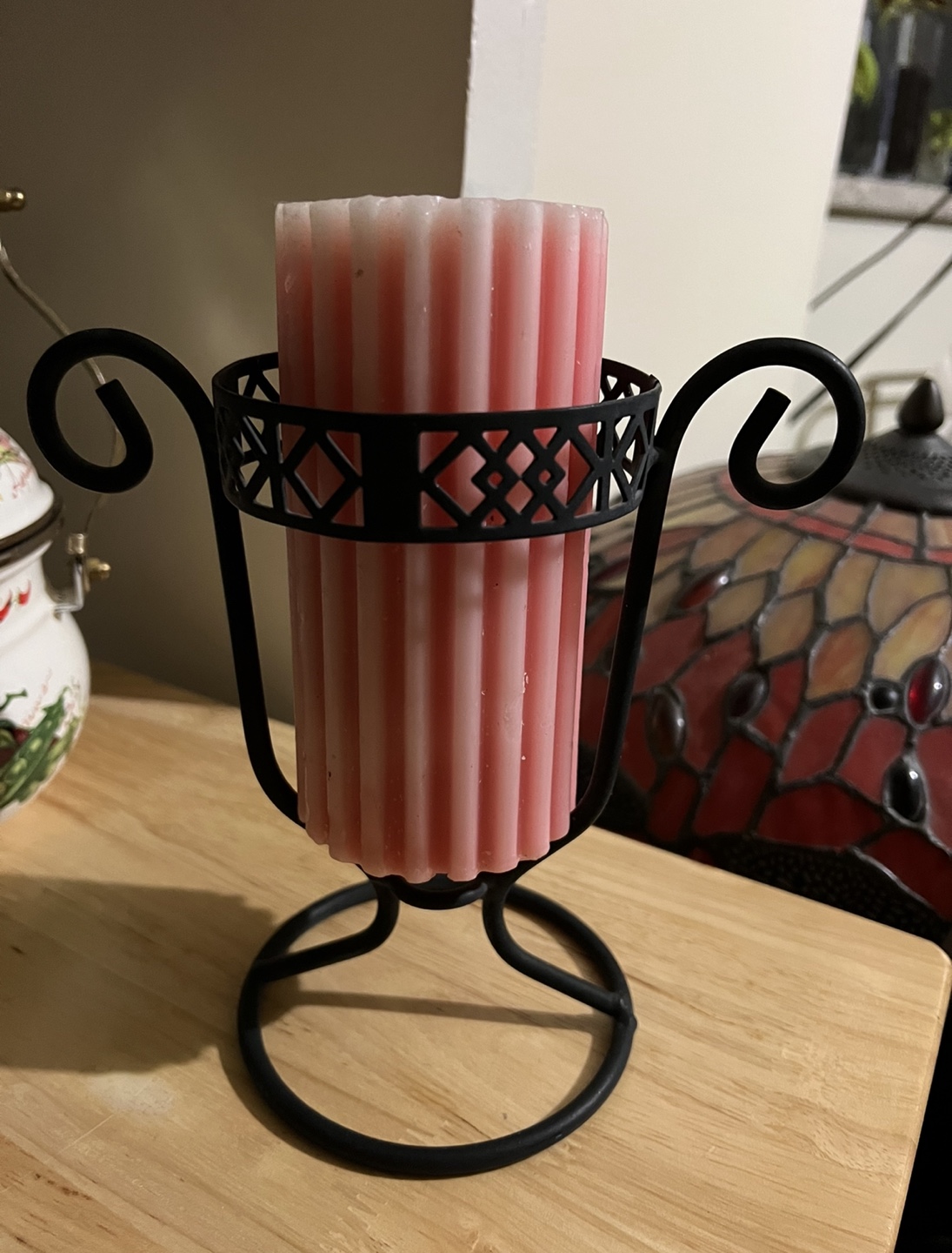 Pink and White Striped Candle with Black Holder