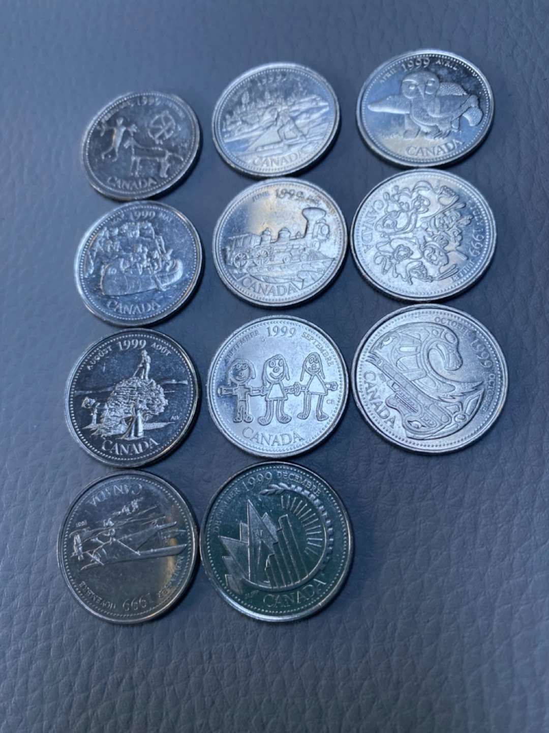 81 coins - Canada Millennium Quarters - 1999 Collection