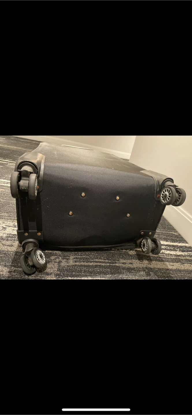 28" large like new Black Rolling Suitcase - photo 2