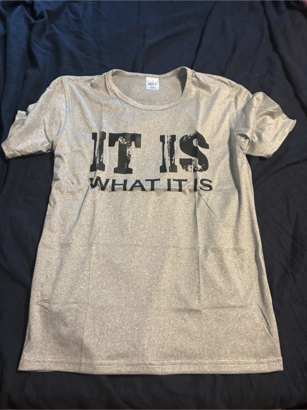 Gray T-shirt with "IT IS WHAT IT IS"