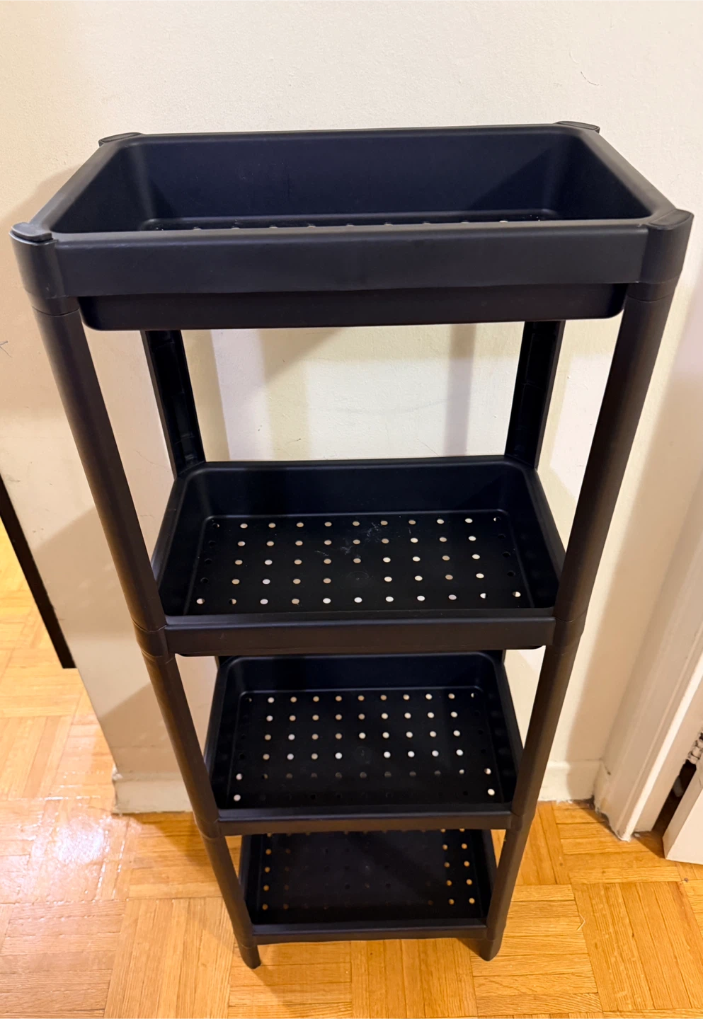 Black plastic Shelf Unit