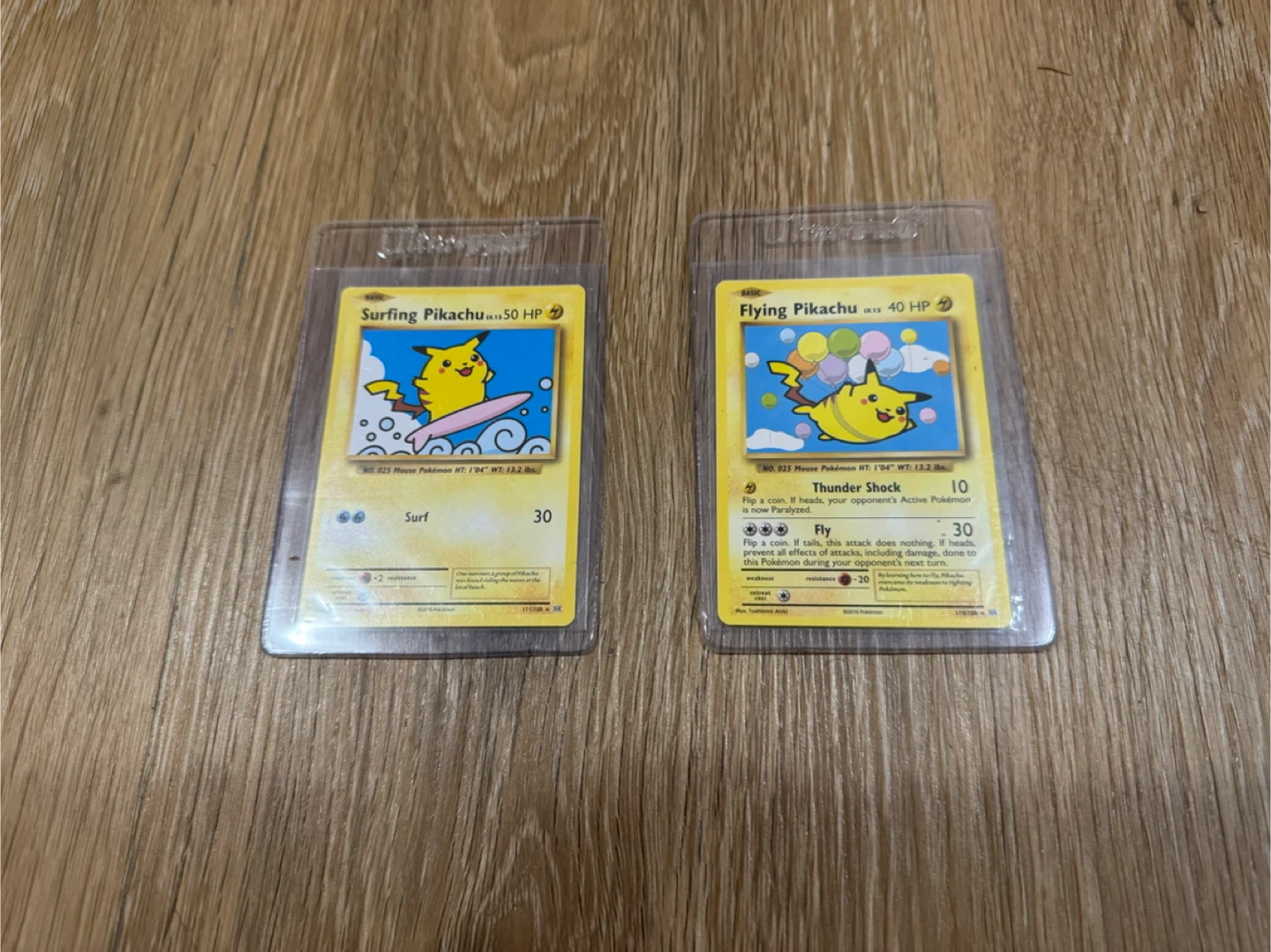 Pokémon XY Evolution Flying 110/108 and Surfing Pikachu 111/108