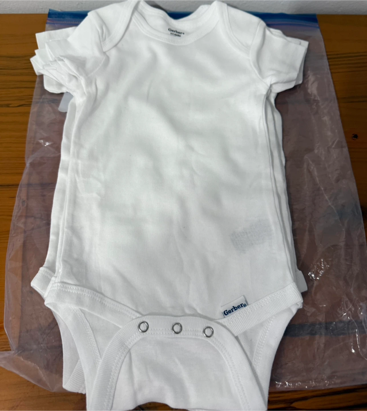 5 Gerber White Onesies, Size 6-9 Months
