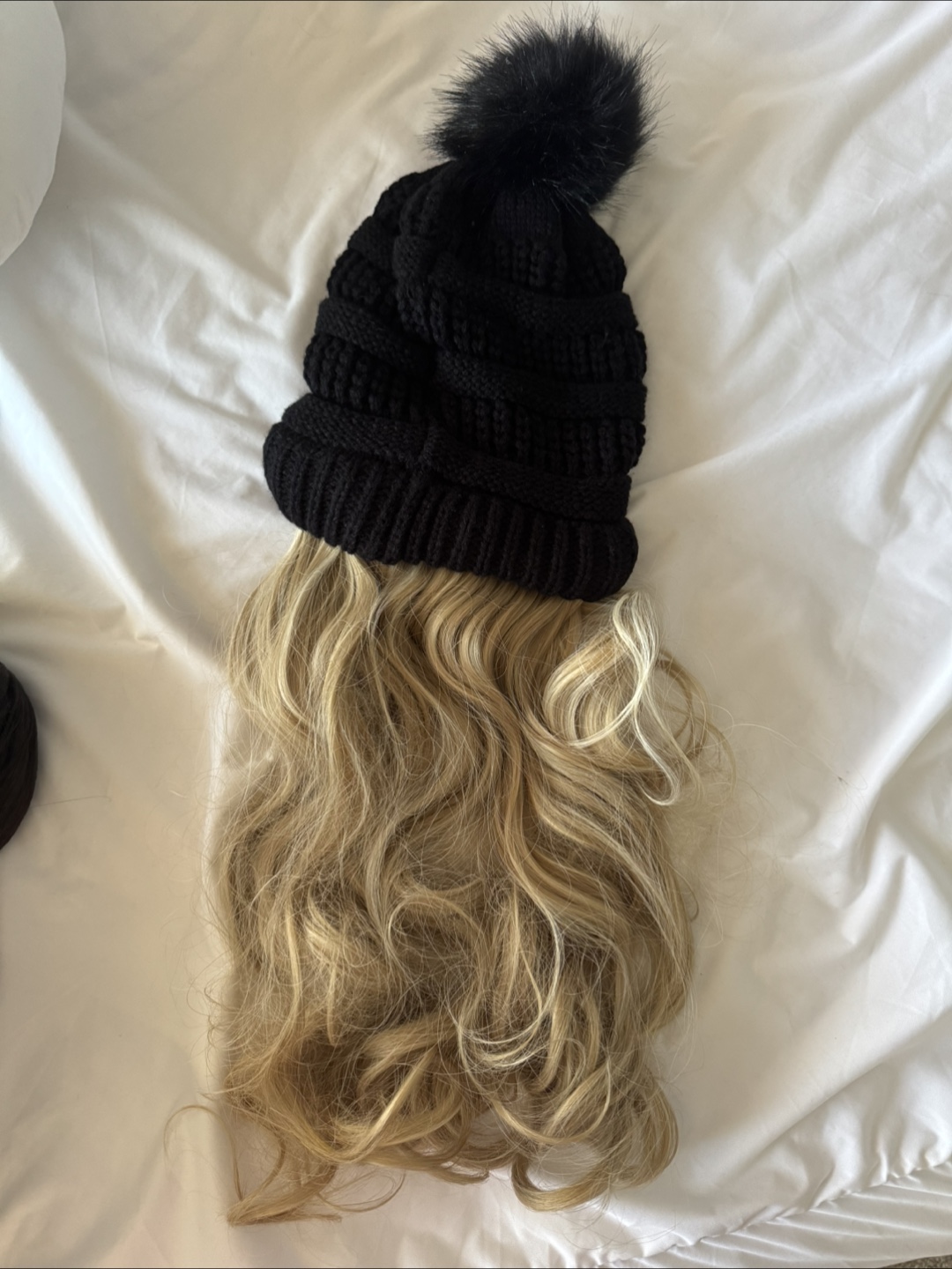 Hat with synthetic wig